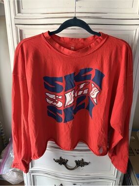 Free People Movement Orange-Red Long-sleeve Inspire Tee with “Ski” Graphic. NWOT